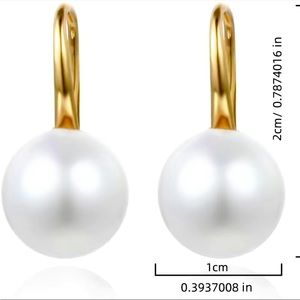 Pearl like gold tone earrings